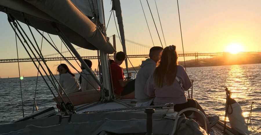 Lisbon Sunset Sailing – Small Group (max 10) Wine & History - Meeting Mabi IV beneath the 25th of April Bridge