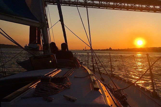 Lisbon Sunset Sailing Tour with White or Rosé Wine and Snacks - Under the 25th of April Bridge