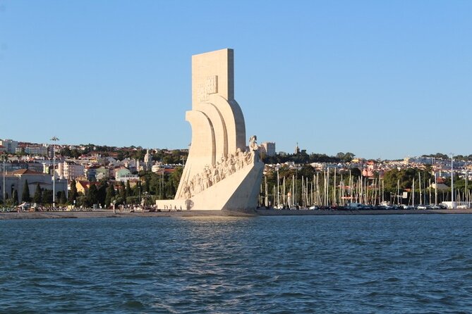 Lisbon: Sunset Sailing with Local Wine & Stunning Views - What the two-person crew adds