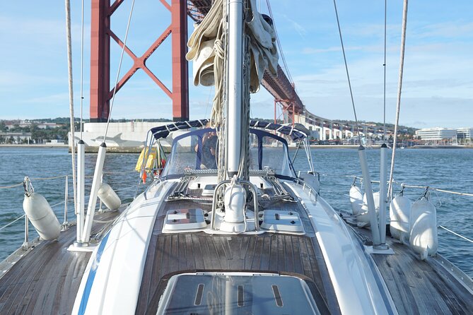 Lisbon: Sunset Sailing with Local Wine & Stunning Views - The Monument to the Discoveries from the river
