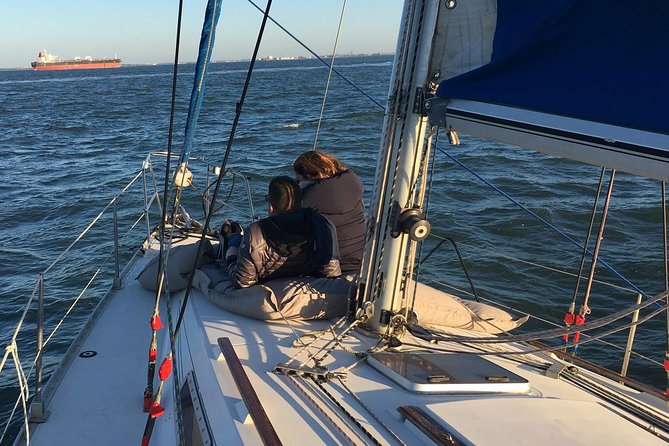 Lisbon Sunset Sensations on a Private Sailing Boat with wine&snacks - MAAT and the waterfront’s modern face
