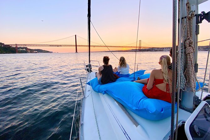 Lisbon: Sunset Tagus River Sailing Tour with Drinks - Boarding at Alcântara and settling onto the yacht