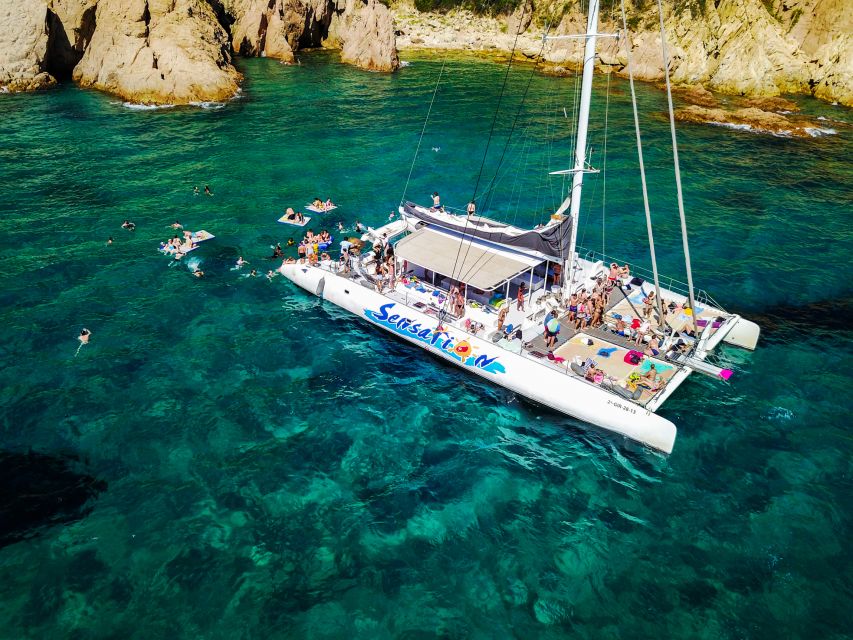 Lloret de Mar: Catamaran Sailing Cruise with BBQ and Drinks - Two hours at anchor for swimming and snorkeling