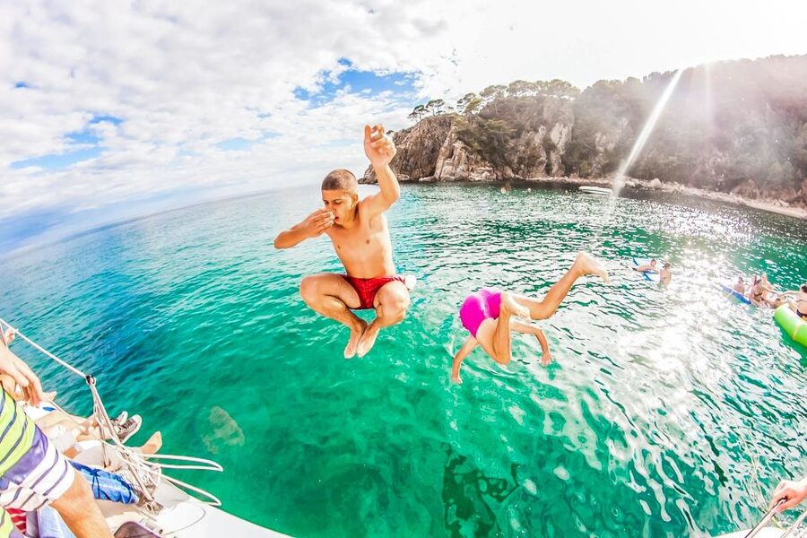 Lloret de Mar: Catamaran Sailing Cruise with BBQ and Drinks - Drinks, vouchers, and what to expect