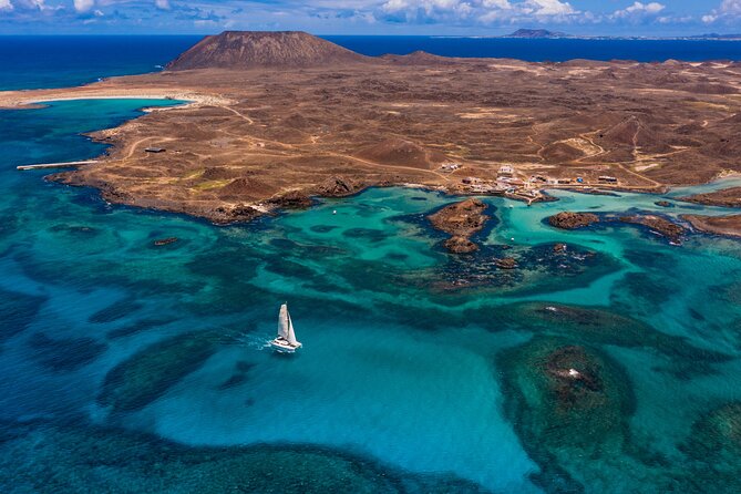 Lobos Island Half-Day Sailing Tour with Lunch - Playa de la Concha is the main event