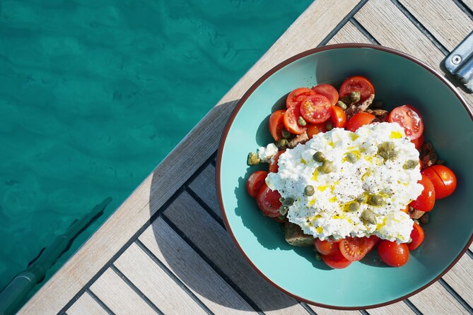 Luxury Catamaran Sunset Semi-Private & Greek Gastronomy in Athens - Greek food served while the boat is anchored
