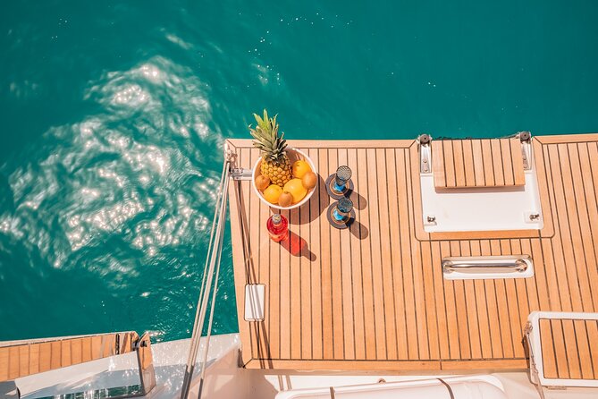 Luxury Catamaran Sunset Semi-Private & Greek Gastronomy in Athens - A small boat with a friendly crew