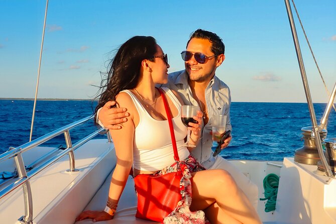 Luxury Sunset Sailing Cruise in Cancun with Light Dinner and Open Bar - Watching the sunset over the Mexican Caribbean