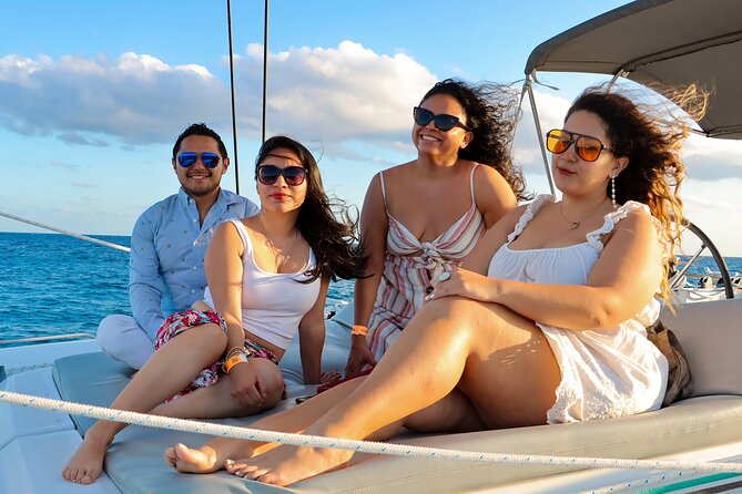Luxury Sunset Sailing Cruise in Cancun with Light Dinner and Open Bar - Open bar, music, and the evening mood