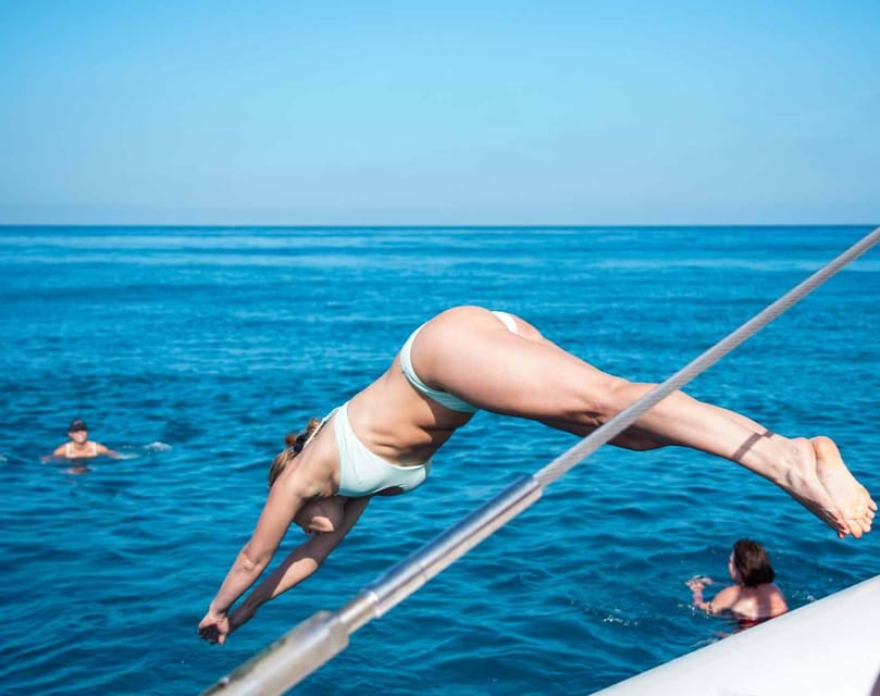 Malaga: Catamaran Sailing Cruise with Swimming & Optional DJ - The swimming stop depends on the sea
