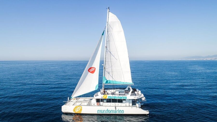 Malaga: Catamaran Sailing Trip with Sunset Option - Cava, music, and the relaxed onboard mood