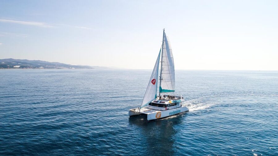 Malaga: Sailing Catamaran with Swimming and Paella Lunch - Leaving Malaga by catamaran