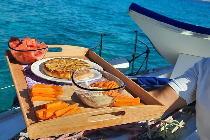 Mallorca Sailing Adventure with Snorkeling, Snacks & Drinks - Snacks, Wine, and Simple Boat Fare