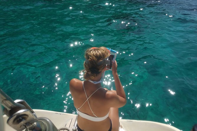 Mallorca sailing, snorkelling, as a Local with drinks and food - Swimming and snorkeling in clear Mediterranean water