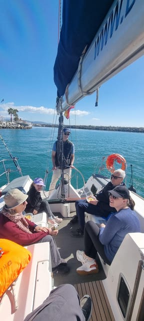 Marbella: Dolphin-Watching Sailboat Trip with Drinks, Snacks - Leaving Port Bajadilla for open water