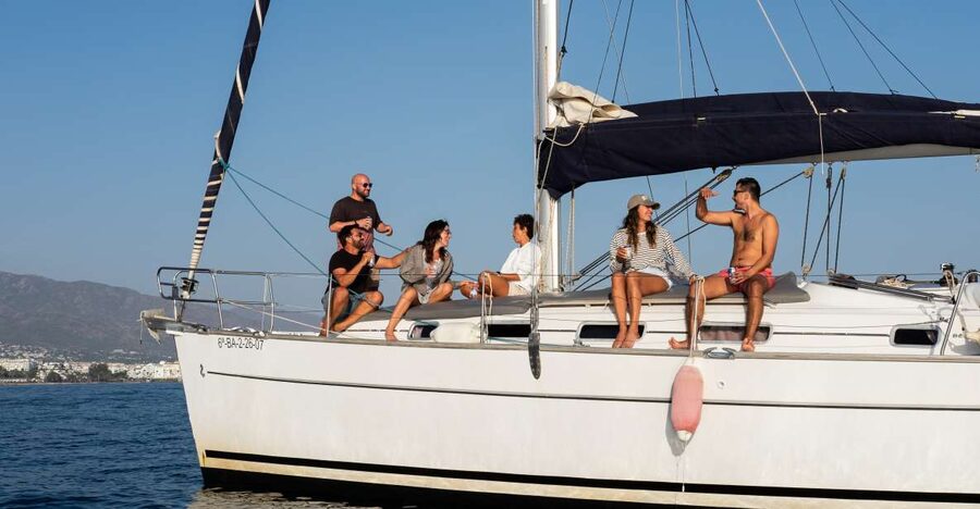 Marbella: Sailing & Dolphin Watching with Snacks and Drinks - Searching for dolphins off Marbella
