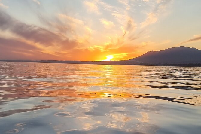 Marbella- sunset from a sailboat with drinks - Key points to know before boarding