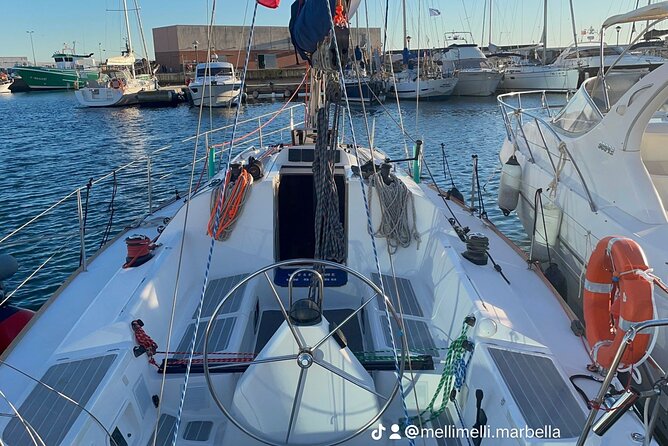 Marbella- sunset from a sailboat with drinks - A closer look at Lucky, the Elan 37