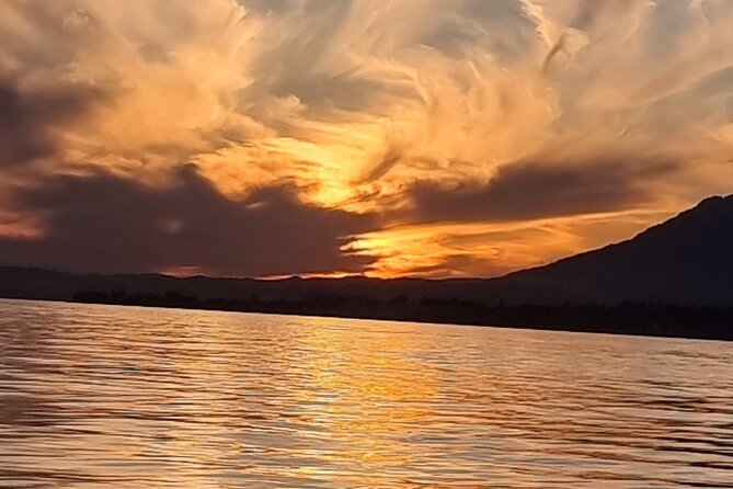 Marbella- sunset from a sailboat with drinks - Weather, waves, and the honest drawback