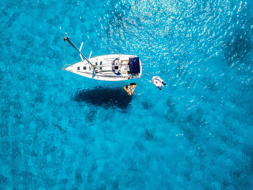 Milos: Full-Day Kleftiko Poliegos Sailboat Tour with Lunch - Cape Vani and the first swim near Agathia