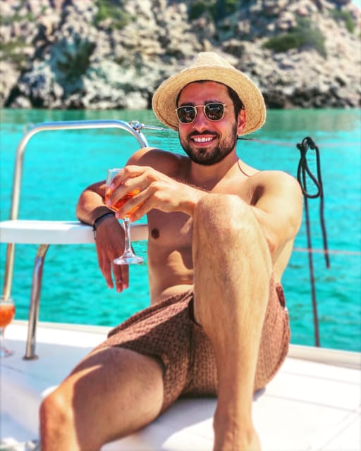 Milos: Full-Day Kleftiko Poliegos Sailboat Tour with Lunch - Gerakas Beach, lunch, and more time in the water