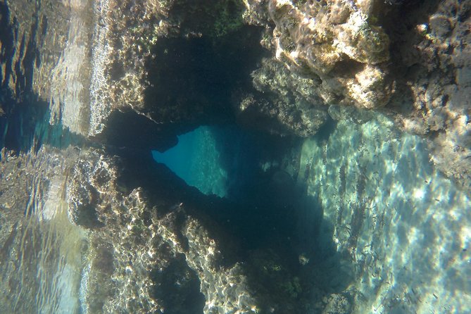 Milos Sailing Tour with snorkeling and lunch - Sailing past the Bears, Adamas, and Cape Vani