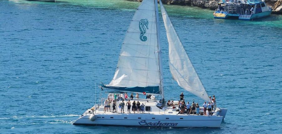 Nassau: Catamaran Sail and Snorkel Tour - Reaching the reef near Athol Island or Spruce Cay