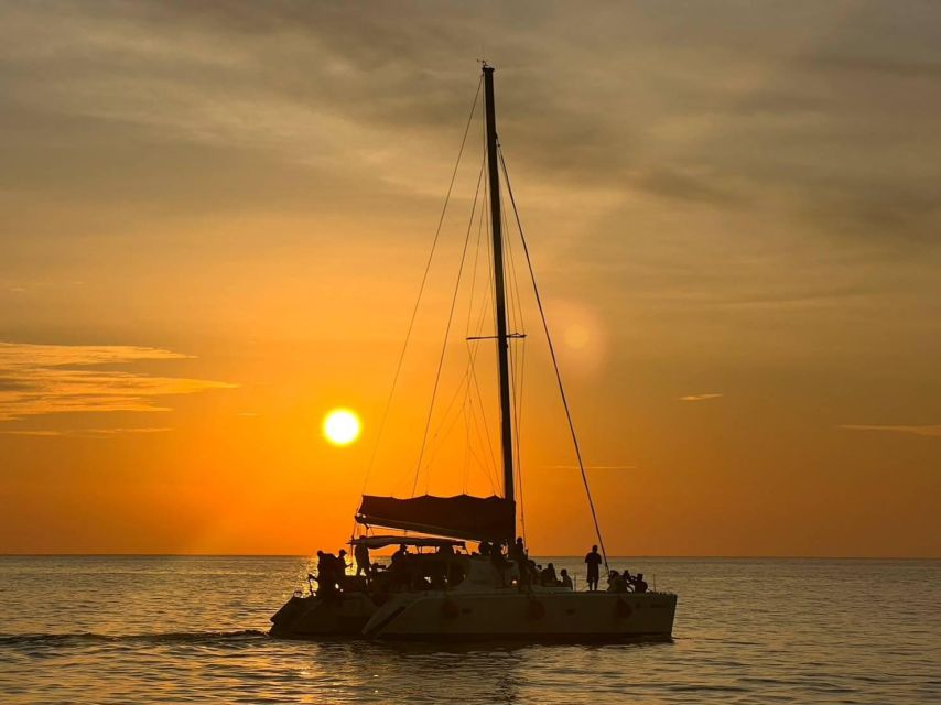Phuket: Coral Island & Sunset Dinner by Sailing Catamaran - The catamaran ride across to Koh Hey