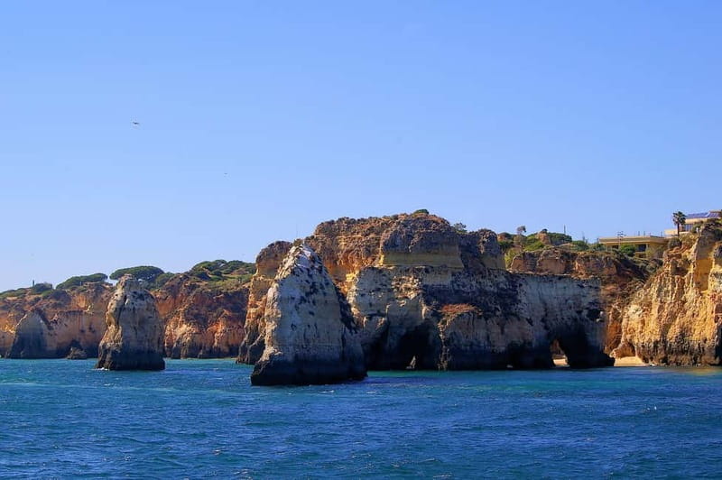 Portimão: Boat Trip by Sailing Boat to Lagos Cape Caves - Reaching Ponta da Piedade