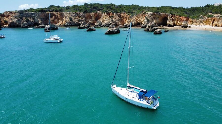 Portimão: Private Sailing Boat Tour with Swim and Wine - What the crew adds to the experience