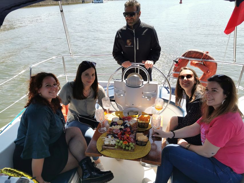 Porto: Private Sailboat Trip with Wine Tasting & Charcuterie - Tasting beside the Dom Luís I Bridge