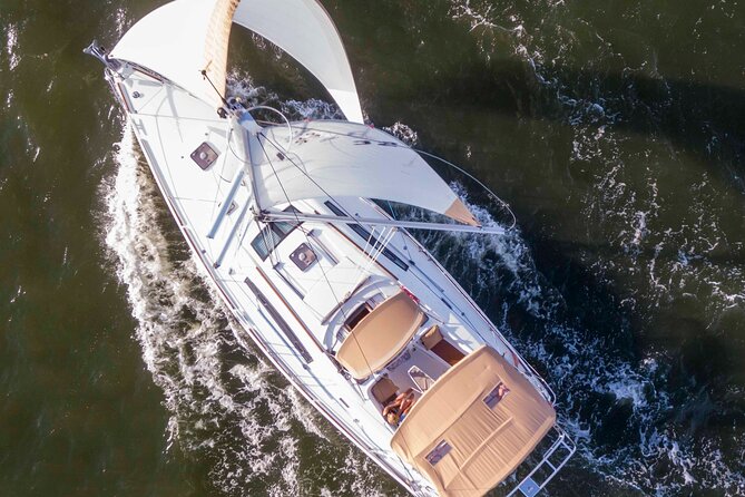 Private Afternoon Sailing/Dolphin & History Tour on 43ft Mystique - Dolphins, open water, and the luck factor