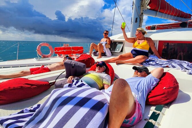 Private Full-Day Luxury Sailing Catamaran Charter in Sint Maarten - Cruising the coastline with Captain Mike