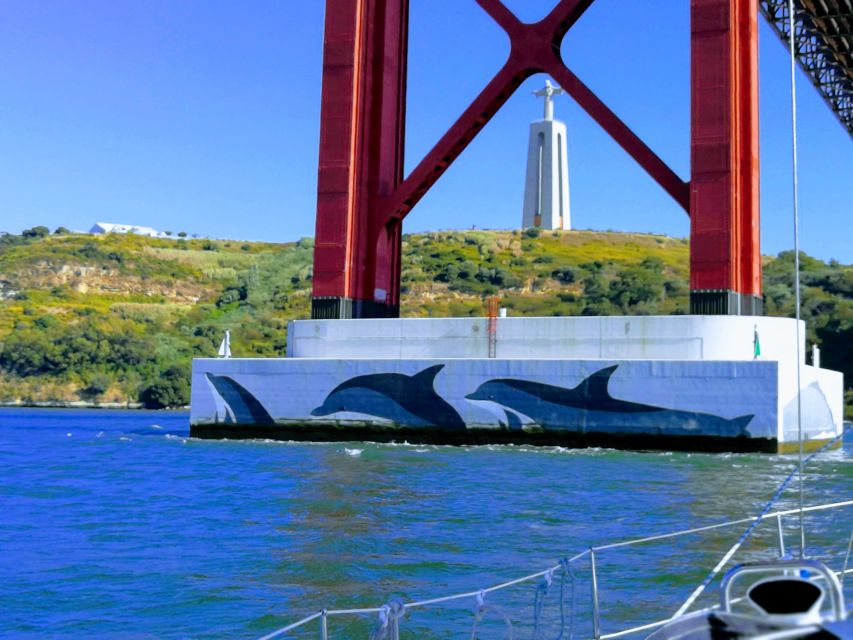Private Lisbon Sightseeing Sailing Boat Tour with Locals - A welcome drink, a Bluetooth speaker, and a relaxed pace