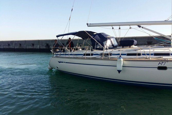 Private Sailboat Cruise with Barbecue and Drinks - Sailing beneath the 25 de Abril Bridge