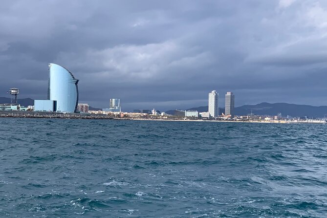 Private sailing and paddlesurfing tour with skipper up to 11 people - Port Vell, the old harbor, and the city’s maritime side