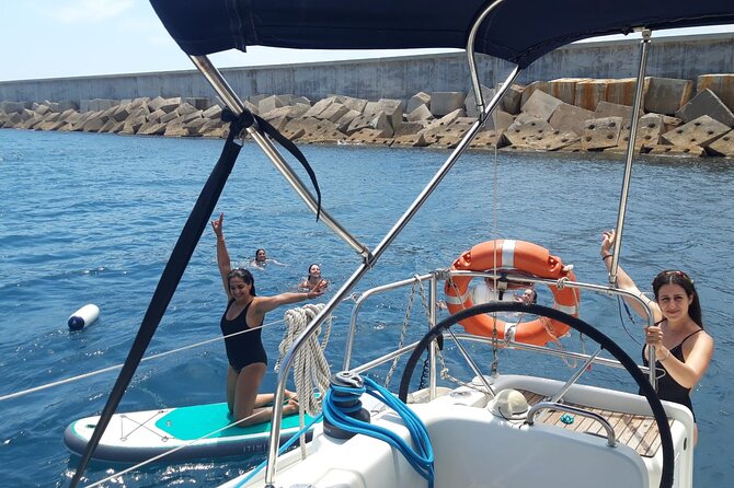 Private sailing and paddlesurfing tour with skipper up to 11 people - Barcelona’s skyline from the Mediterranean
