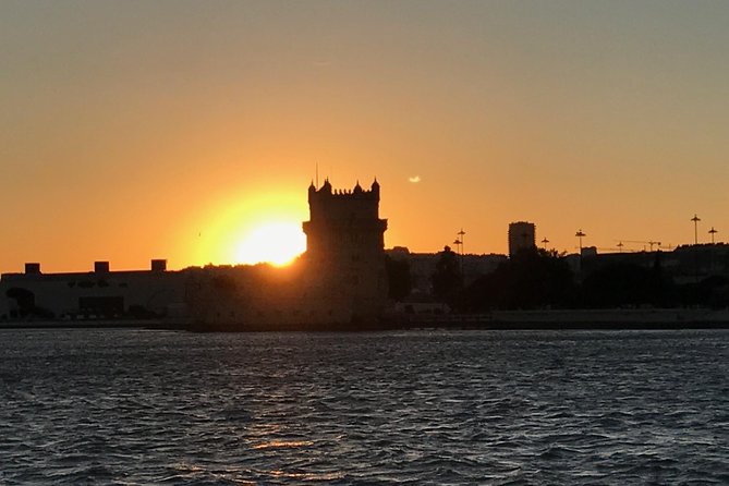 Private Sunset Sailing cruise from Lisbon - Under the 25th April Bridge