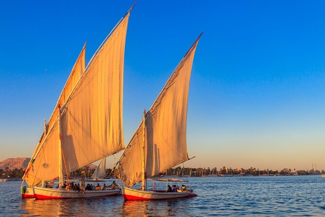 Private Tour Sail on the Nile Luxor Felucca Ride - A quiet Nile hour in busy Luxor
