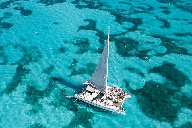 Sail Away Catamaran Day Trip with Snorkeling to Isla Mujeres - What the $25 fare really buys you