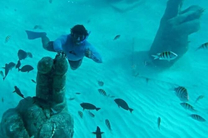 Sail Away Catamaran Day Trip with Snorkeling to Isla Mujeres - One hour to get a taste of Isla Mujeres