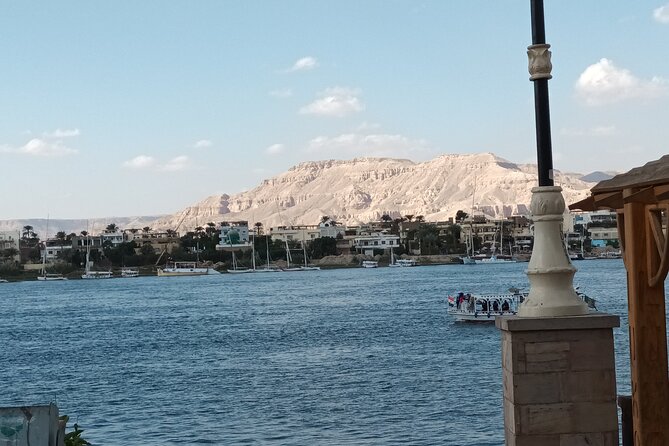 Sail into Splendor: Luxor's Majestic Motor Boat Adventures - Luxor Temple from the water