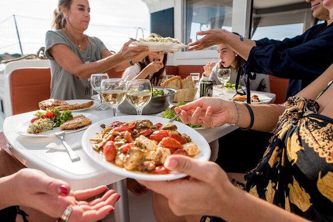 Sail the Athenian Coastline on a Catamaran with Meal & Wine - Greek lunch served onboard