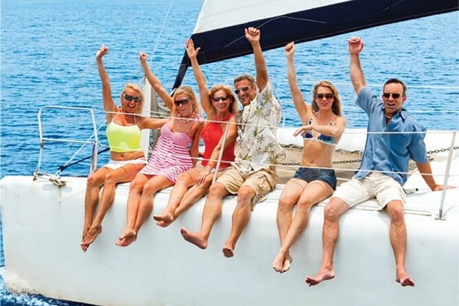 Sailing Catamaran Party to Isla Mujeres from Cancun - Sailing across Cancun’s turquoise Caribbean water