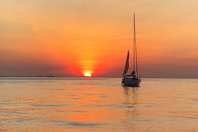 Sailing tour to the sunset in Lisbon - Praça do Comércio, the Sé, and Alfama from offshore