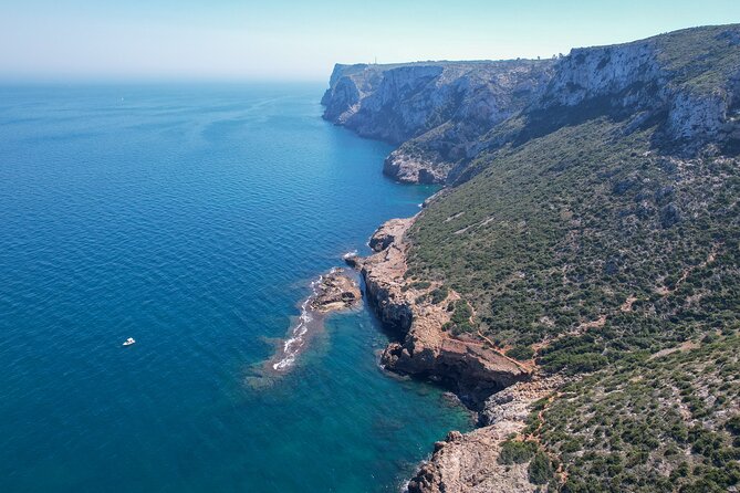 Sailing trip and swim in the bay of Dénia on a catamaran - Sunset light and the five o’clock start