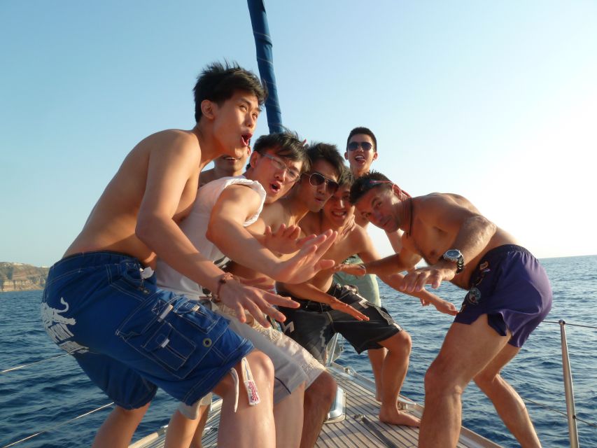 Santorini Caldera: Morning Sailing Cruise with Meal - Passing the lighthouse and entering the caldera