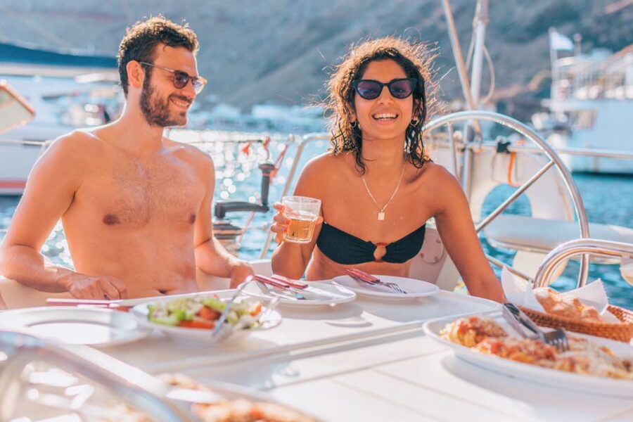 Santorini Caldera: Sunset Sailing Cruise with Meal - Swimming and snorkeling near Mesa Pigadia