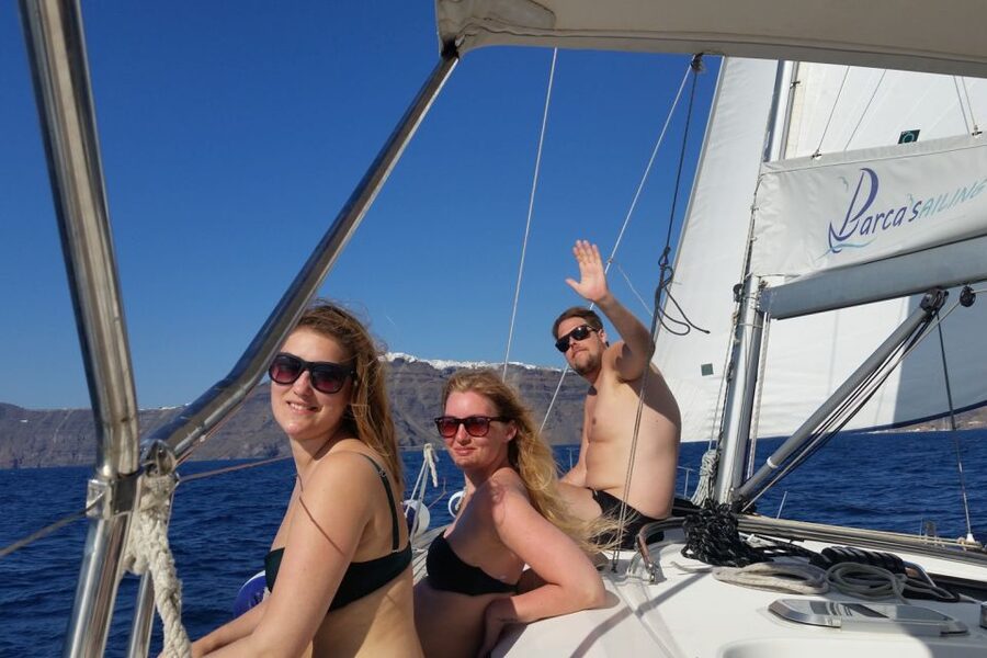 Santorini Caldera: Sunset Sailing Cruise with Meal - Akrotiri Lighthouse and the turn into the caldera