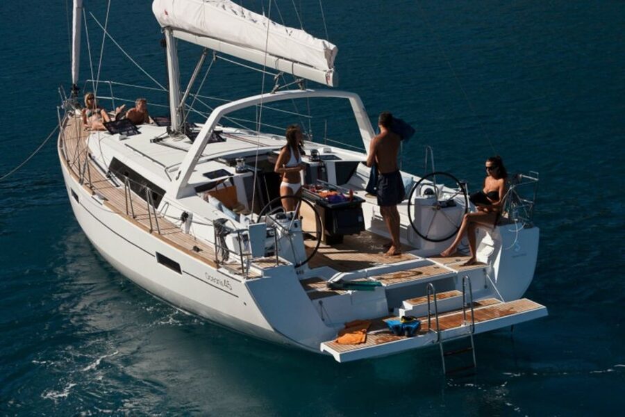 Santorini: Private Caldera Sailing Trip with Open Bar & Meal - Red Beach and the southern volcanic coast